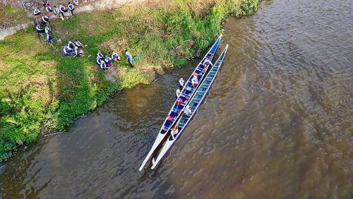 High angle view of people on boat in river