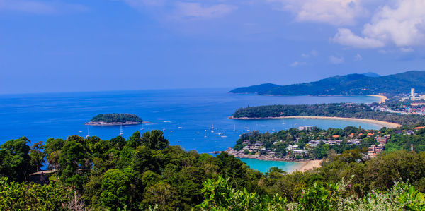 High angle view of sea against blue sky