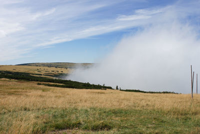 Scenic view of land against sky
