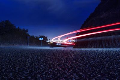 Light trails on road at night