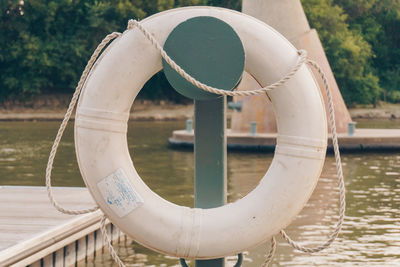 Close-up of built structure in river