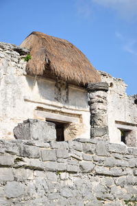 Low angle view of old building against sky