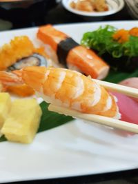 Close-up of sushi served on table