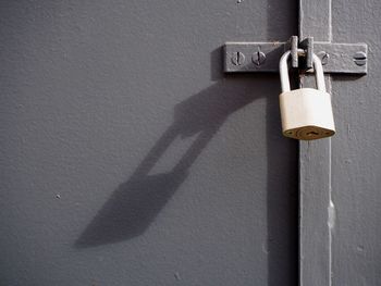 Padlock on closed metal door