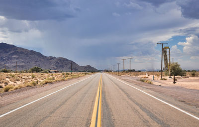 Road on landscape against sky