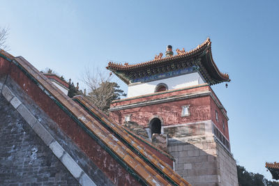 Low angle view of temple building against clear sky