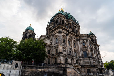 View of cathedral and buildings against sky