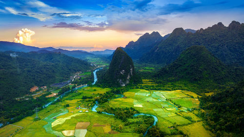 Scenic view of mountains against sky during sunset