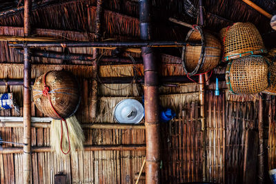 Stack of wicker basket hanging in hut