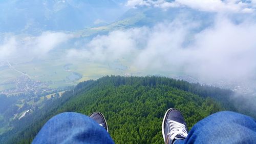 Scenic view of landscape against cloudy sky