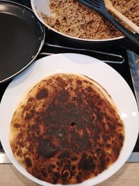 High angle view of bread in plate on table