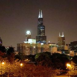 View of city lit up at night