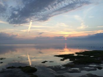 View of calm sea at sunset