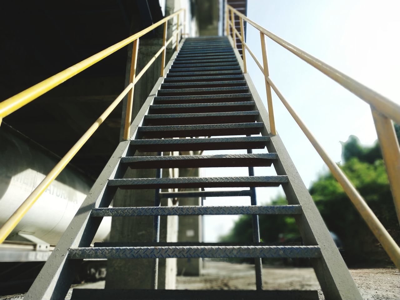 LOW ANGLE VIEW OF STEPS AND BUILDING