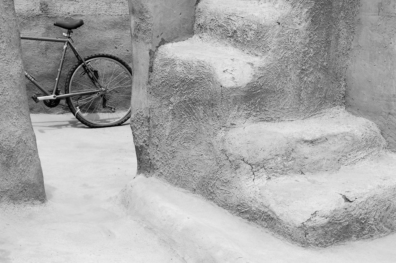 BICYCLE PARKED ON WALL