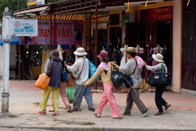 Group of people walking outdoors