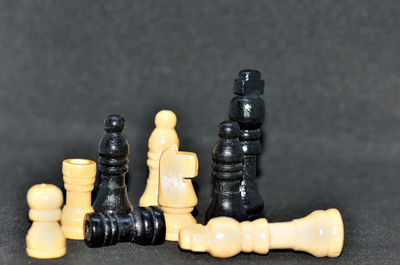 Close-up of chess pieces against black background