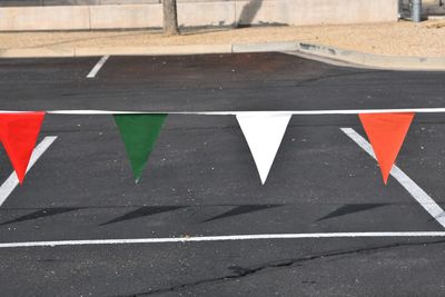 Colorful pennants in a parking lot