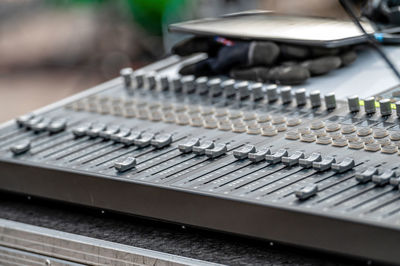 Sound and audio mixer control panel with buttons and sliders. audio sound mixer console. close-up