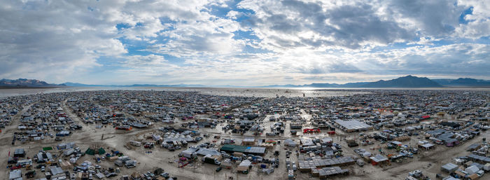 Aerial view of townscape against sky