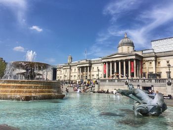 Tourists in front of building