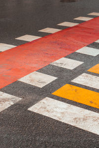 High angle view of arrow sign on road