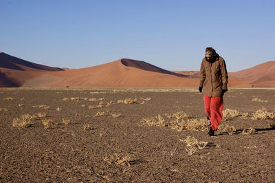 Full length of person in arid landscape