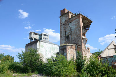 Low angle view of old building against sky