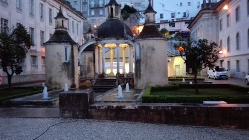 Buildings in city at night