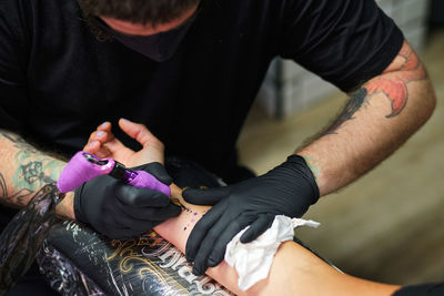 Midsection of man working