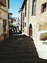 Narrow alley along buildings