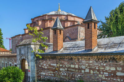 Low angle view of traditional building against clear sky