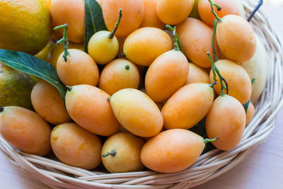 High angle view of oranges in basket