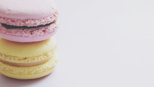 Close-up of cake against white background