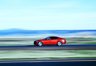 Red car on road