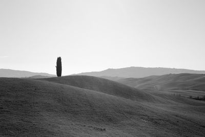 Scenic view of desert against clear sky