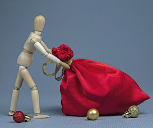 Close-up of figurine on table against blue background