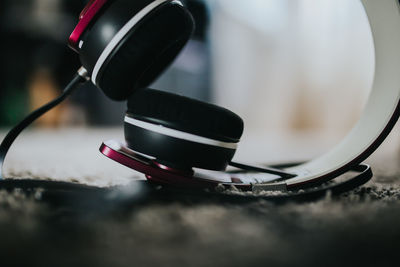 Close-up of headphones on rug