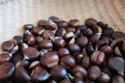 Close-up of chestnuts in wicker container