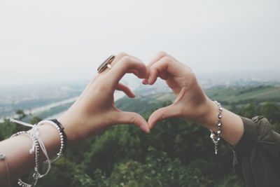 Cropped image of woman holding hands