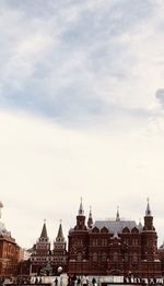 Buildings in city against sky