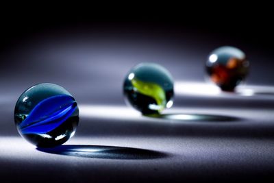 Glass spheres on table