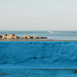 Scenic view of sea against clear sky
