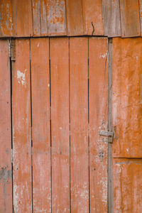 Full frame shot of weathered wooden door