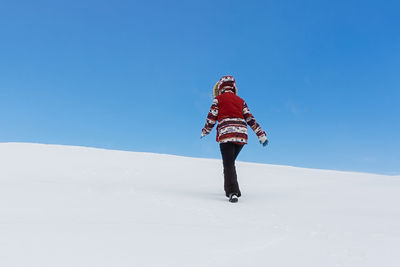 Snowy landscape of a tourist. a winter fairy tale with snow-covered christmas trees. a woman 