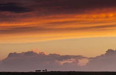 Scenic view of mountains against sky during sunset