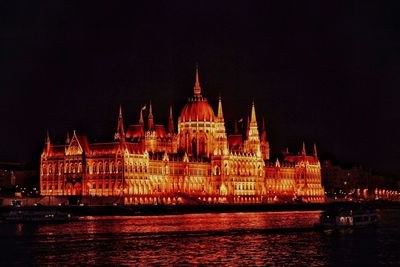 Illuminated city lit up at night