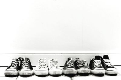 Canvas shoes against wall at home
