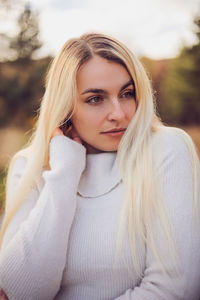 Portrait of young woman looking away