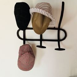 Hats hanging against wall